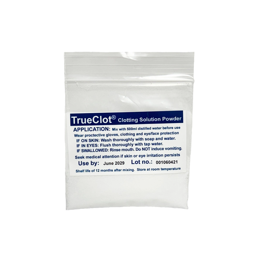 TrueClot clotting solution powder packet with application instructions, used to mix simulated blood clots for wound packing practice, haemorrhage control training, moulage, and realistic trauma simulation scenarios.