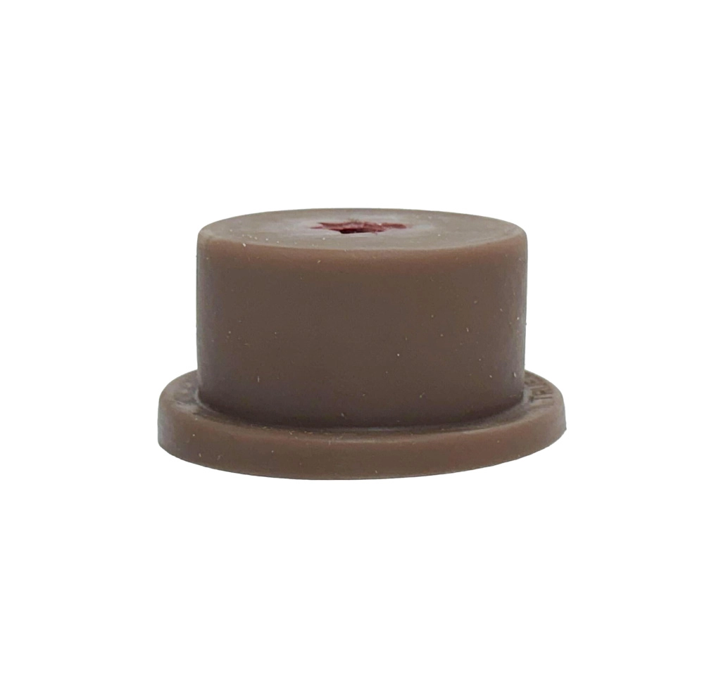 Side view of the TrueClot dark skin tone wound packing training insert featuring a central simulated gunshot wound for bleeding control, first aid training, and trauma skills development.