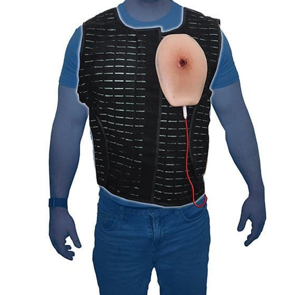 Training vest with an attached simulated chest wound module used for realistic first aid and trauma response practice.