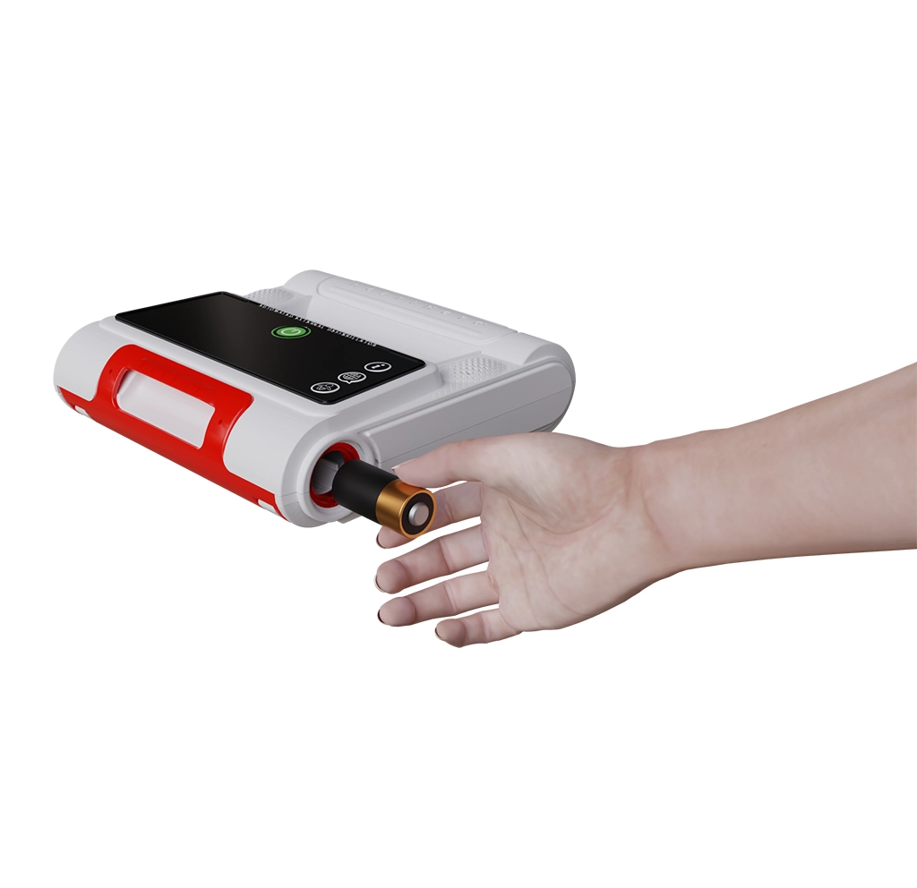 Close-up of the AED battery compartment as a CR123 lithium battery is inserted, highlighting correct battery installation and orientation.