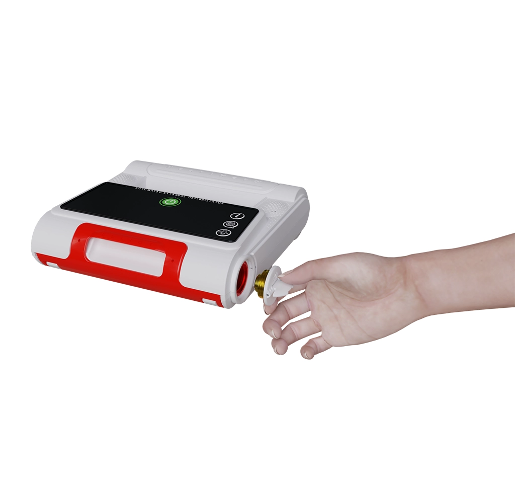 Side view of the HeartHero Elliot AED showing the battery compartment open, with a hand removing the battery door to demonstrate access for maintenance.