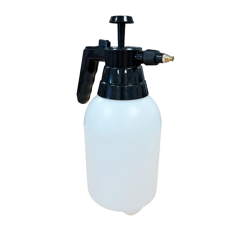 A white spray bottle with a black pump handle and nozzle attachment.