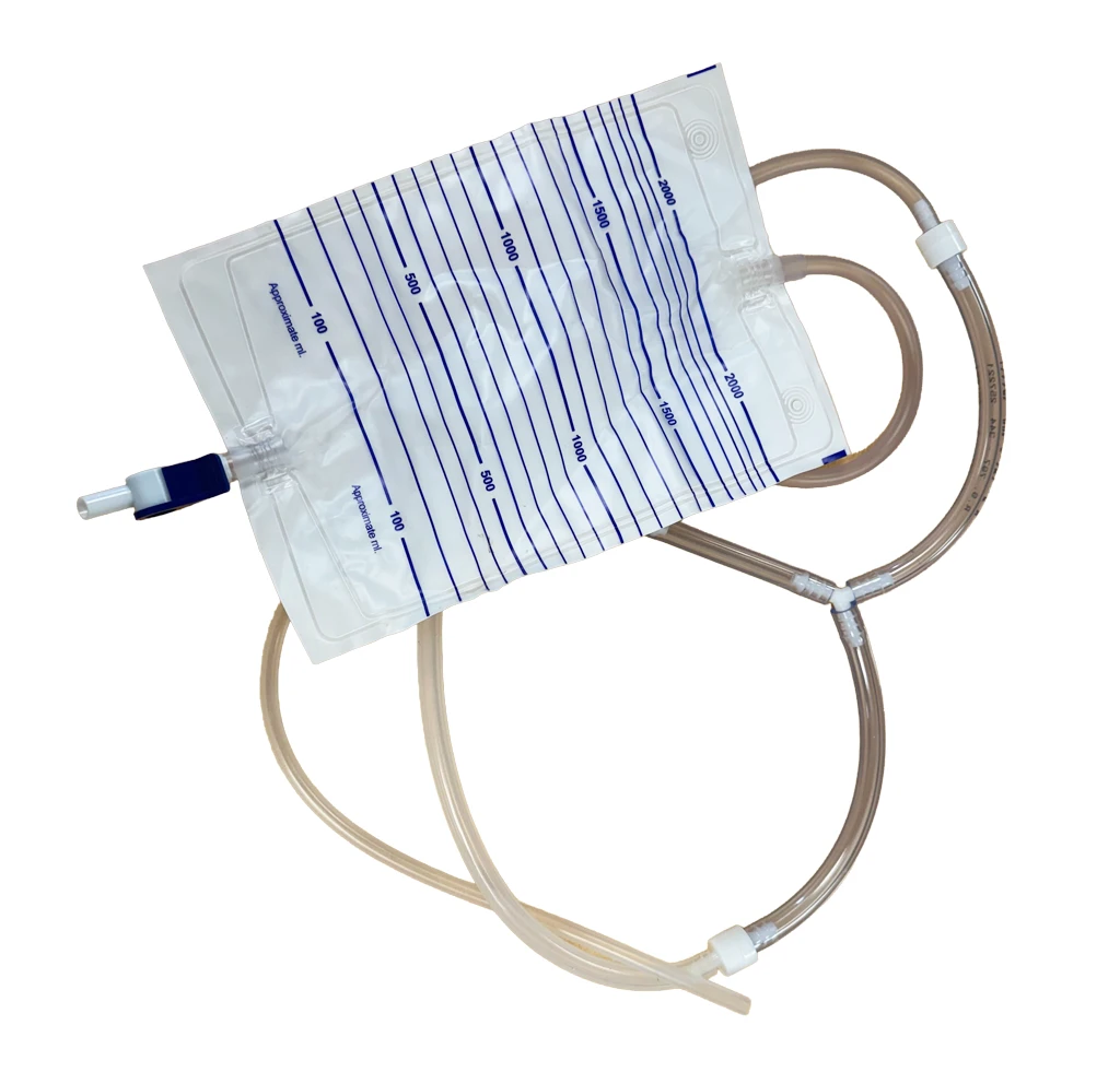 A clear fluid collection bag with measurement markings and attached tubing.